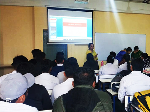 A guest lecture being conducted on Multi-level Marketing